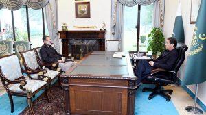 AJK Prime Minister Sardar Abdul Qayyum Niazi in a meeting with Prime Minister Imran Khan